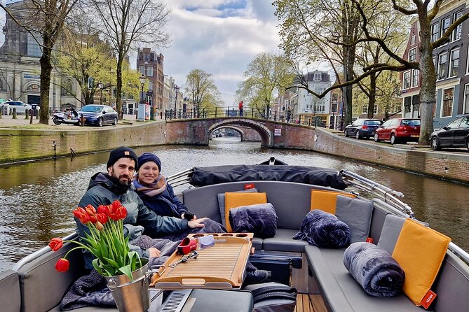 Private 90 Minute Amsterdam Canal Belt Exploration Cruise - Open-boat comfort: what’s included and what you should plan for