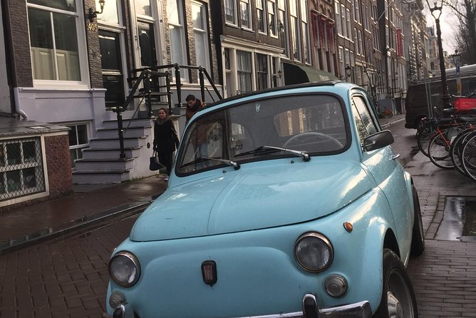 Private Amsterdam Bike Tour with a local guide (also for families) - Dam Square and Damstraat, where the city begins