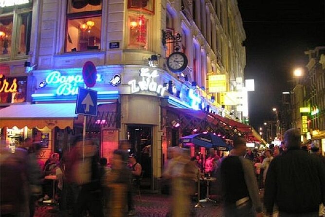 Private Amsterdam Red Light District and Coffee Shop Tour - Getting oriented at Damrak, and why the route matters