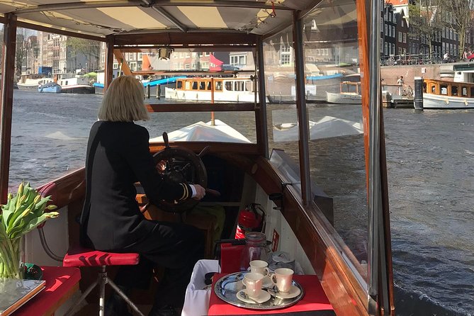 Private canal cruise on small historic boat - Skinny Bridge and the Amstel Locks: Where the Route Gets Interesting