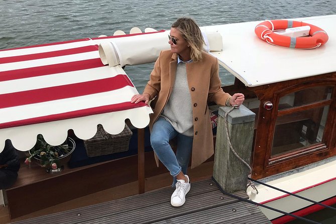 Private canal cruise on small historic boat - The Famous Seven Bridges in Reguliersgracht and the Jordaan Turn