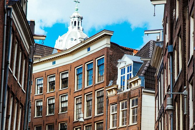 Private City Kickstart Tour: Amsterdam - Bloemenmarkt and Begijnhof: flowers and quiet medieval space