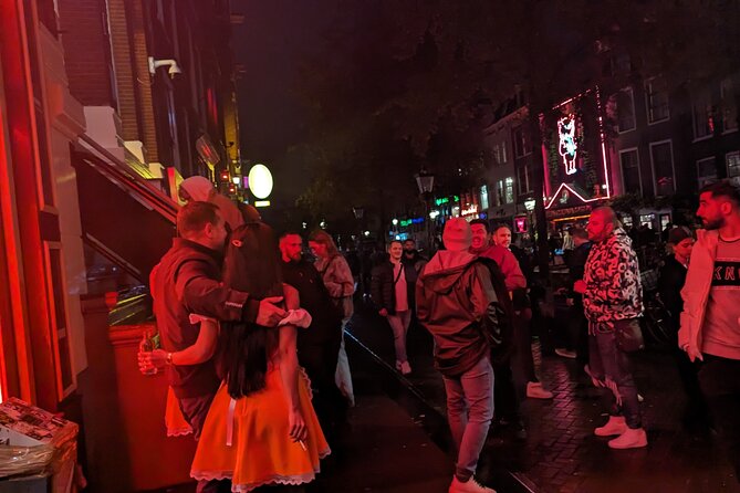 Private Hostess Bar Tour in Amsterdam Red Light District (3h) - Oude Kerk stop: oldest Amsterdam context in the middle of nightlife