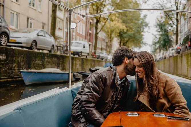 Private Romantic Canal Cruise Amsterdam with Bubbly and Snacks - The Guide Makes It: Soft Music, Real Stories, and Even Proposal Energy