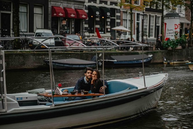 Private Romantic Canal Cruise Amsterdam with Bubbly and Snacks - Prosecco, Dutch Snacks, and Blankets That Actually Add Up
