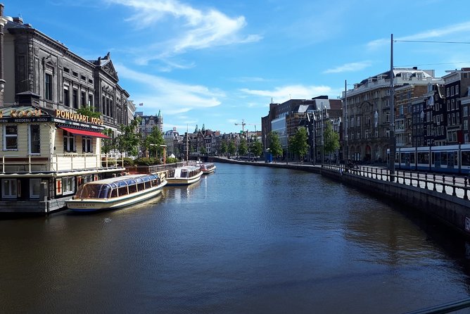 Private Tour: Amsterdam City Walking Tour and Canal Cruise - Ending at Albert Cuyp Market, then leveling up with the canals
