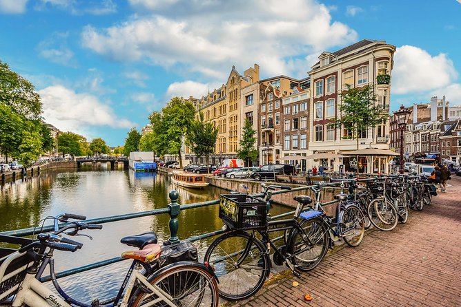 Private Tour: Amsterdam City Walking Tour and Canal Cruise - Jordaan, old churches, and the Anne Frank House area on foot