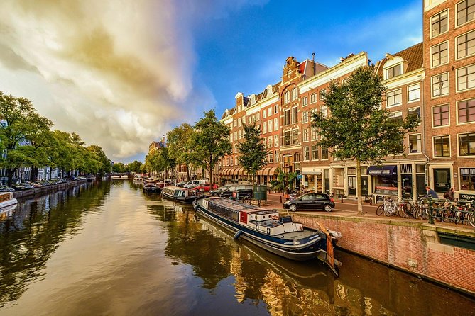 Private Tour: Amsterdam's City Highlights and Hidden Gems - Jordaan: old working-class neighborhood, walked at the right pace
