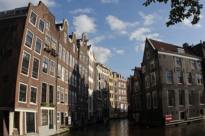 Private Tour: Amsterdam's City Highlights and Hidden Gems - De Wallen overview by canals, not hype