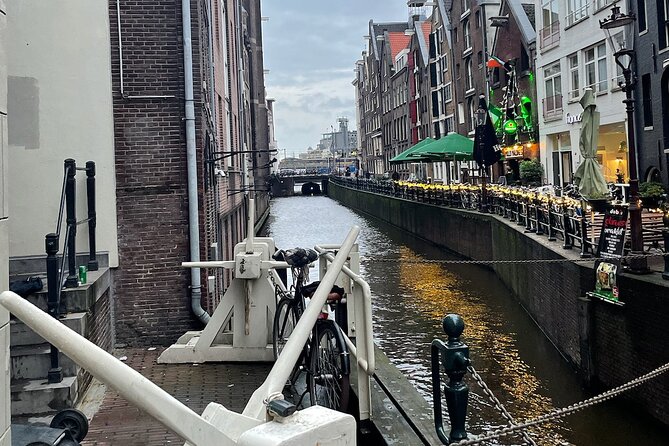 Private Walking Tour of Amsterdam - Station Grandeur, Clubbing Streets, and a City Gate With a Name Mystery