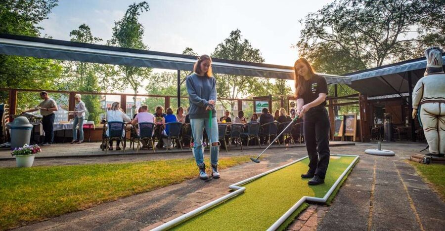 Rotterdam: 18-Hole Mini-Golf Game - Kid-friendly equipment is included, including toddler clubs