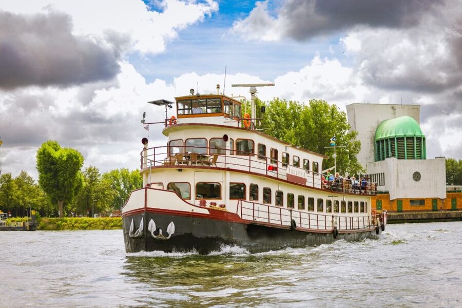 Rotterdam: Harbor Cruise on a Historic Ship - Seating, sun deck views, and onboard bar snacks