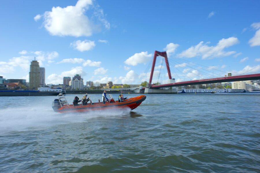 Rotterdam: Private Maas River Speedboat Cruise - Wilton Harbor and the riverfront icons: SS Rotterdam, Willemsbrug, Hotel New York