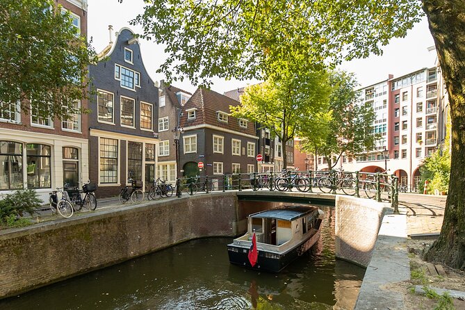 Small Group Boutique All-Inclusive Tour (max 12 p) With Captain - Taxes, the smallest house, and how rules shaped the canal skyline