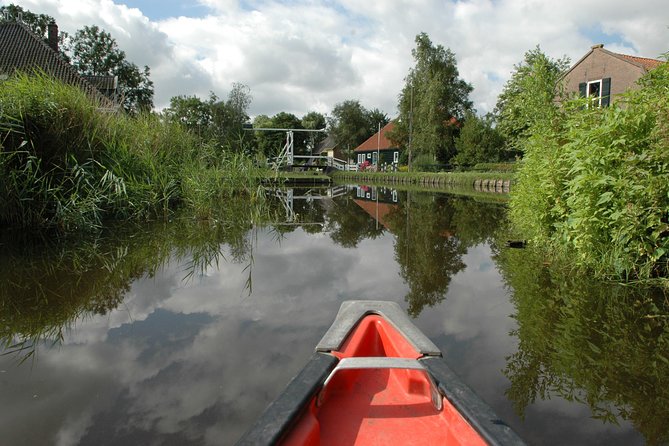 Small-Group Guided Sunset Canoe Tour in Waterland with Dinner - Sunset timing, weather rules, and staying comfortable