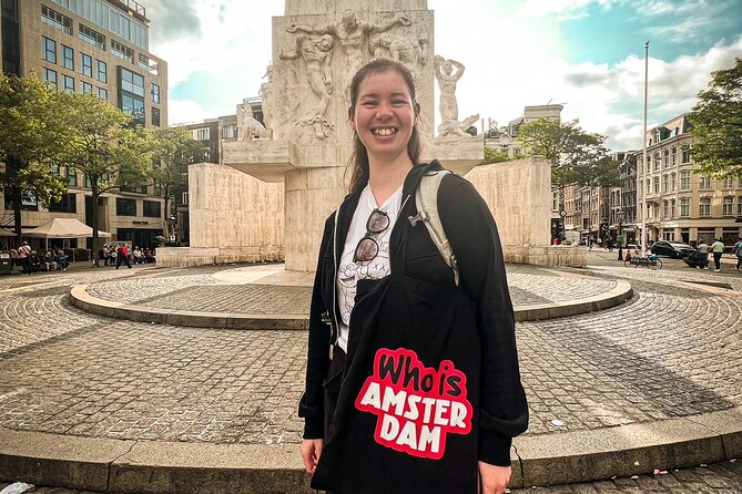 Small Group Walking Tour - Hello Amsterdam - Damrak near the Red Light District, facts with a playful game