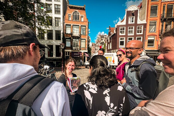 Small Group Walking Tour - Hello Amsterdam - Haarlemmersluis, the canal-belt gateway and bike culture clues