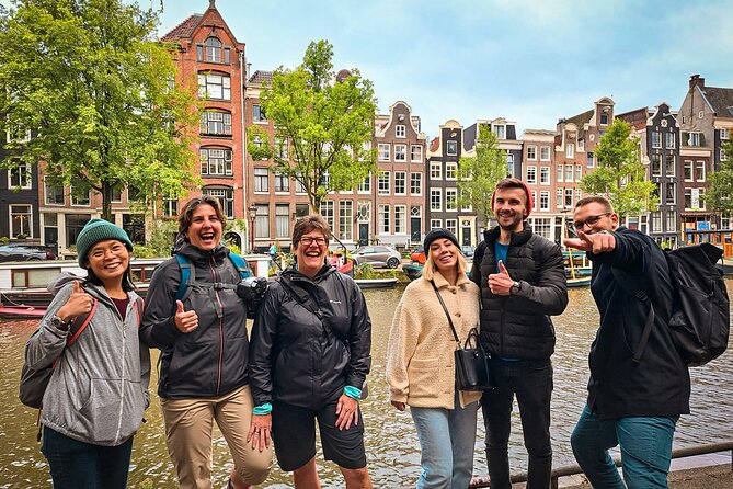 Small Group Walking Tour - Hello Amsterdam - Singel and the Dancing Houses, tilted charm with a purpose