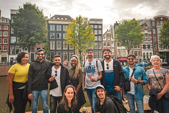 Small Group Walking Tour - Hello Amsterdam - Dam Square and Damstraat, where Amsterdam announces itself