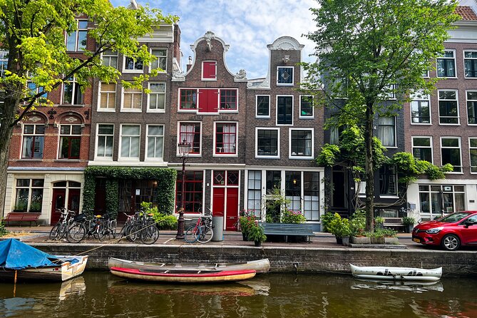 Small Group Walking Tour in Amsterdam with Friendly and Fun Guide - Iconic canals and the 17th-century turning point