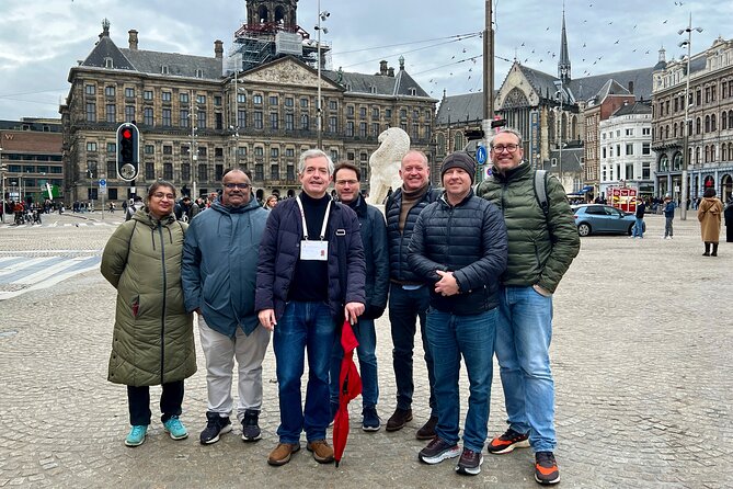 Small Group Walking Tour in Amsterdam with Friendly and Fun Guide - Old Center from Waag to Dam Square: layers you can spot