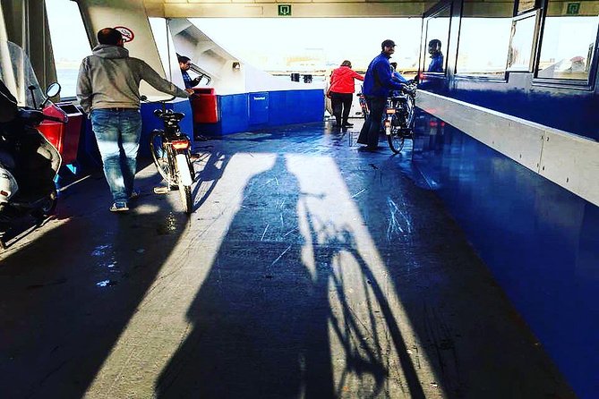 Urban Adventures Amsterdam Bike Tour, Graffiti and Magnet Fishing - Stop 5 Pontsteiger: ferry time to Amsterdam Noord
