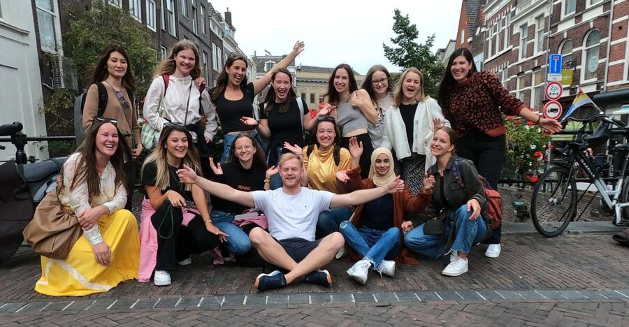 Utrecht: Guided Highlights Walking Tour - Bicycles, an illusion door, and a bar inside a church