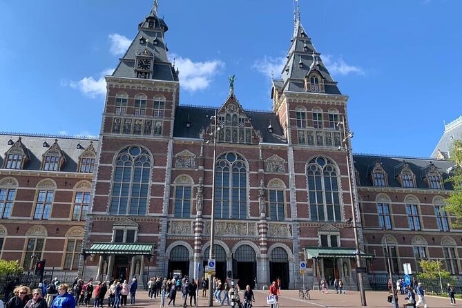 Van Gogh Museum, Rijks Museum & Walking Tour - Private Day Tour - The Amsterdam walking segment: Canal Belt, Red Light District, and real neighborhoods