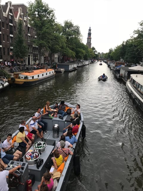 Visit Amsterdam by Boat with a French Guide (french) - Jordaan and De Negen Straatjes: neighborhood texture you can feel from the canals