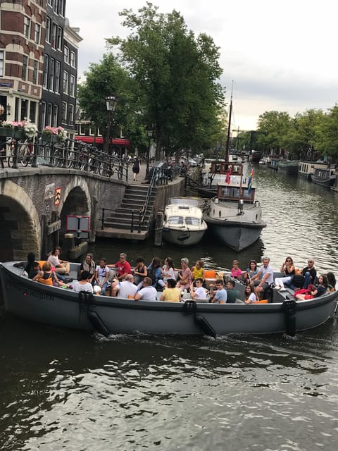 Visit Amsterdam by Boat with a French Guide (french) - Amstel and the Red Light District: stories with boundaries