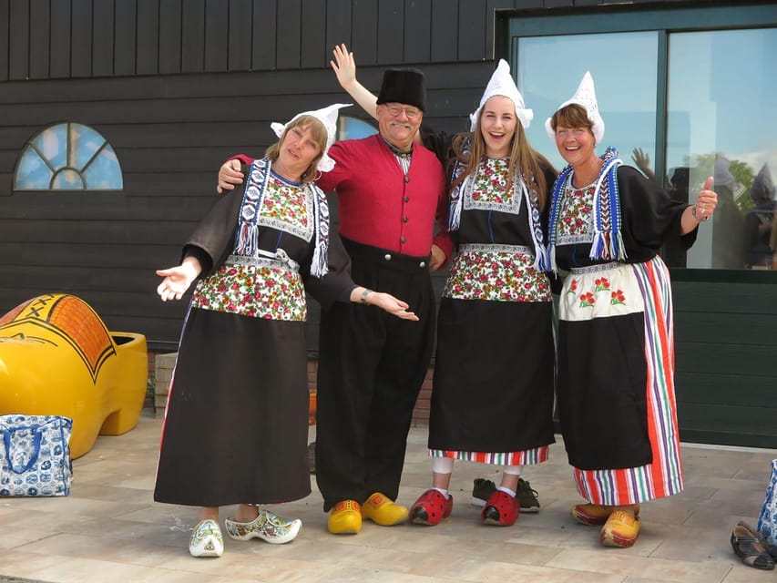 Volendam: Traditional Costume Photo with Cheese & Clog Tour - Your costume photo moment: Volendam clothing and clogs for the camera