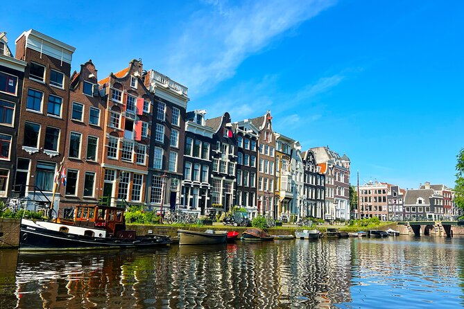Walking Tour about Golden Age Architecture, private local guide - Canal-Belt Baroque and the Look of Wealth: Huis Bartolotti to Torensluis