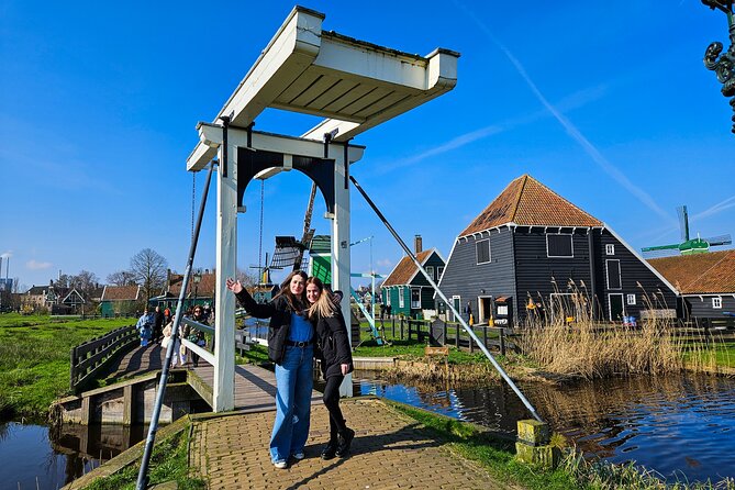 Zaanse Schans and Cheese Tasting Guided Tour from Amsterdam - Canal cruise voucher option, how to add Amsterdam highlights cleanly