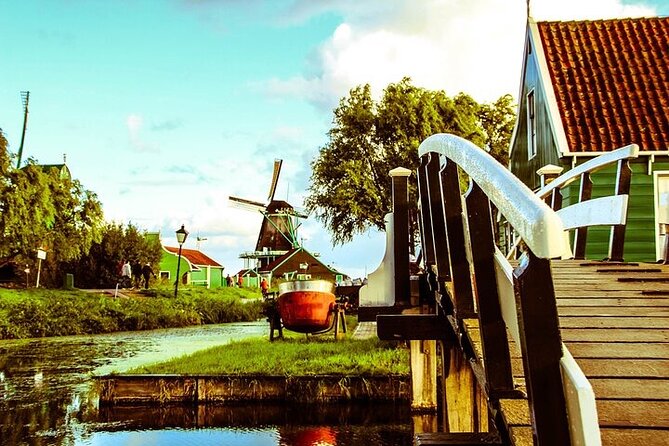 Zaanse Schans Edam Volendam Private Day Tour from Amsterdam - Edam canals and the Weighing House: cheese trade in motion