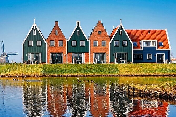 Zaanse Schans Edam Volendam Private Day Tour from Amsterdam - Volendam promenade, herring, and street art you can actually enjoy